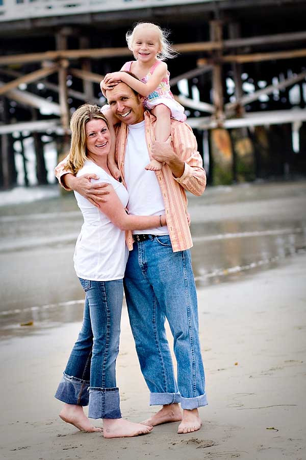 family portraits on the beach Todd, Lily and Stephanie at Crystal Pier